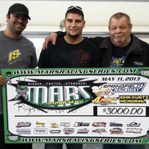 Left to right: Crew chief Zach Gossett, driver Ryan Gustin and car owner Ed Gressel hold the check after winning their first dirt late model event at the Springfield Raceway on Saturday, May 11.